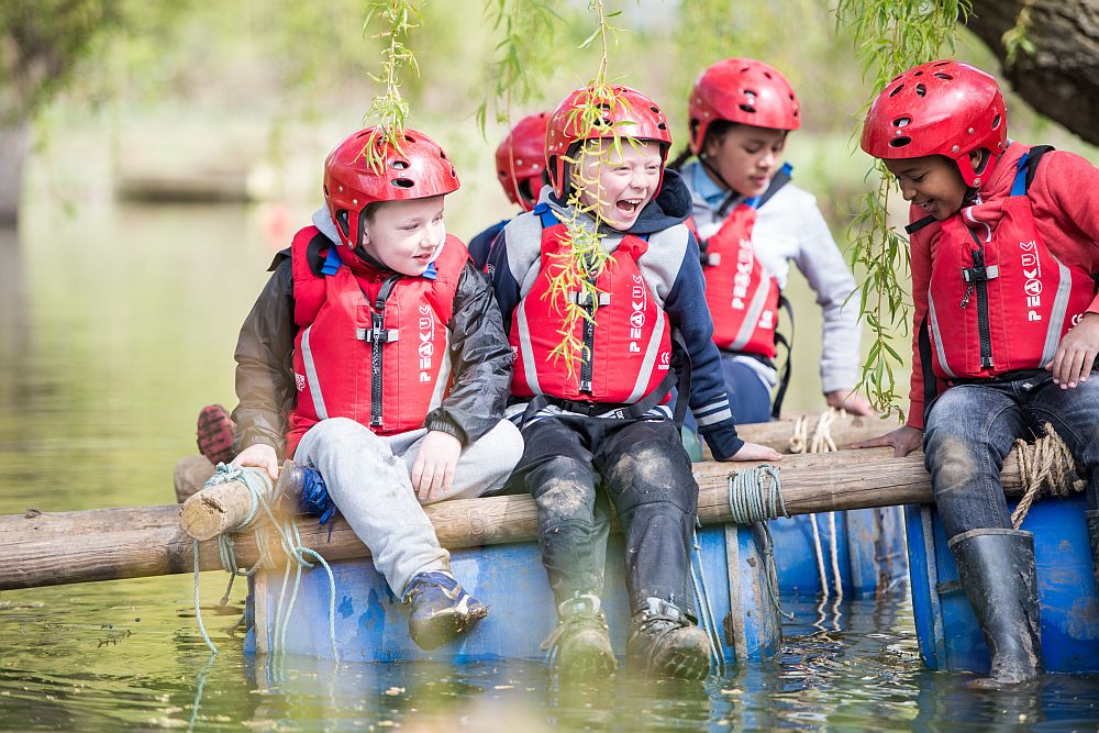 Group of Cubs on a Small Raft